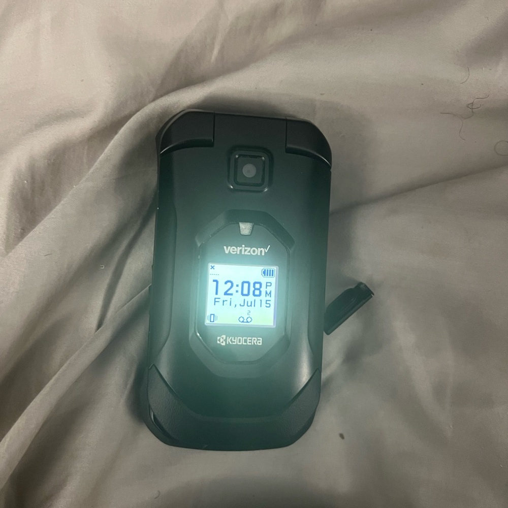 Kyocera Black Flip Phone with Verizon Logo